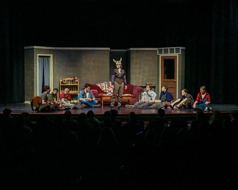 Zoe Jaksa plays charter Jazar, center, helps preform a 2 minute funeral service for a dead goldfish that was put down the drain during a one act play of the Fallen Goldfish that was held on Saturday March, 22, 2025, held at Lyons Township High School south campus.