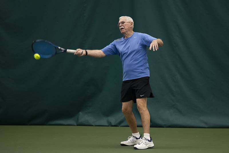 Bob Orta practices tennis with Westwood Tennis Pro Chris Dudley on Thursday, March 19, 2026. Orta has started a scholarship for tennis-playing students from Sterling, Dixon and Newman high schools.