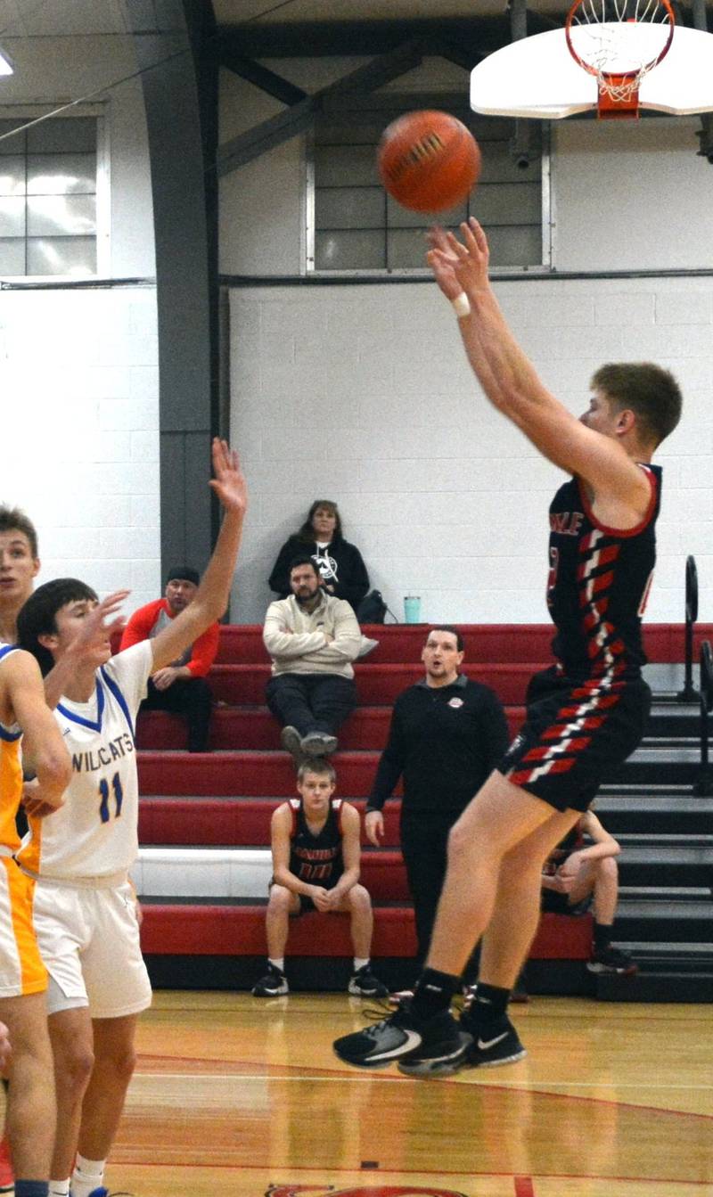 LaMoille's Brayden Klein shoots against Galva in the third-place game of the LaMoille Holiday Classic on Friday. The Lions won 54-51.