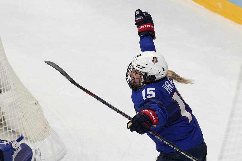 United States' Savannah Harmon (15) celebrates a goal against the Czech Republic during a women's quarterfinal hockey game at the 2022 Winter Olympics, Friday, Feb. 11, 2022, in Beijing. (AP Photo/Petr David Josek)