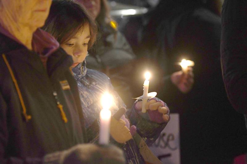 A moment of silence was followed by prayer during a candlelight vigil on Friday, Jan. 9, 2026 on one corner of the Ogle County Courthouse square in Oregon for Renee Nicole Good, a Minnesota woman who was shot and killed during an Immigration and Customs Enforcement (ICE) operation Jan. 7 in Minneapolis. The event was organized by Indivisible of Ogle County.