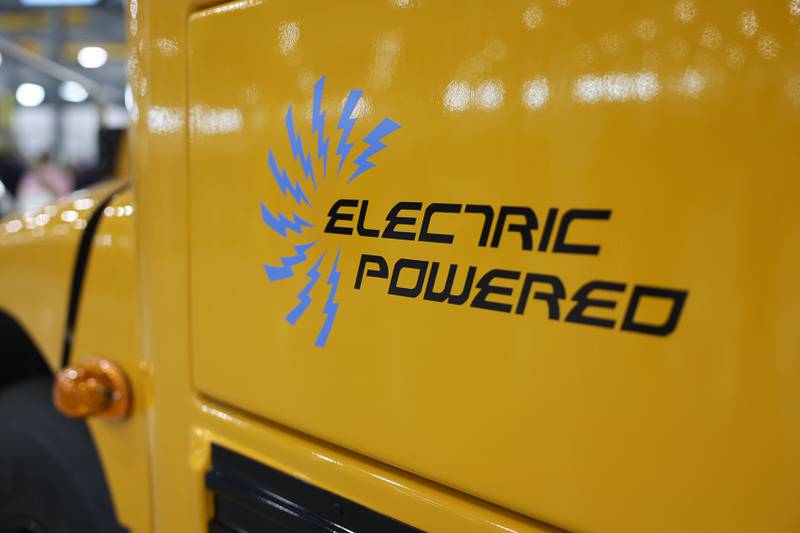 An electric bus sits on display at the grand opening of the Lion Electric manufacturing facility on Friday, July 21st, 2023 in Joliet.