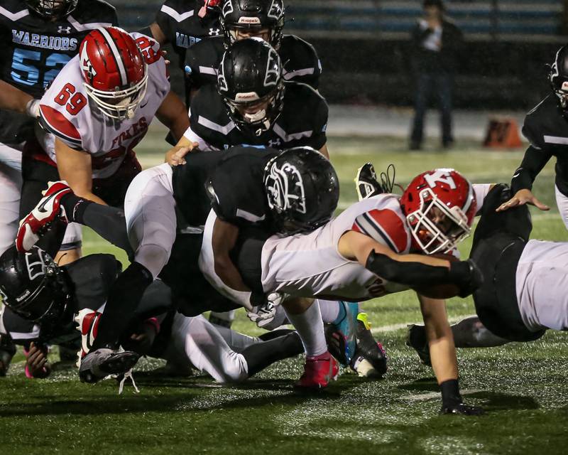 Yorkville's Josh Gettemy (4) dives for extra yards during Class 7A football playoff game between Yorkville at Willowbrook.   Oct 27, 2023.