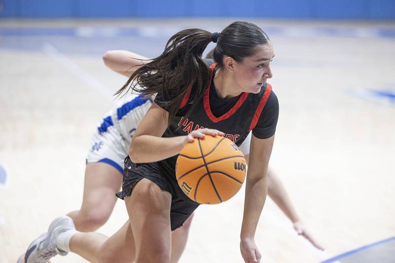 Erie-Prophetstown’s Ashlyn Johnson drives to the hoop against Newman Thursday, Jan. 29, 2026.