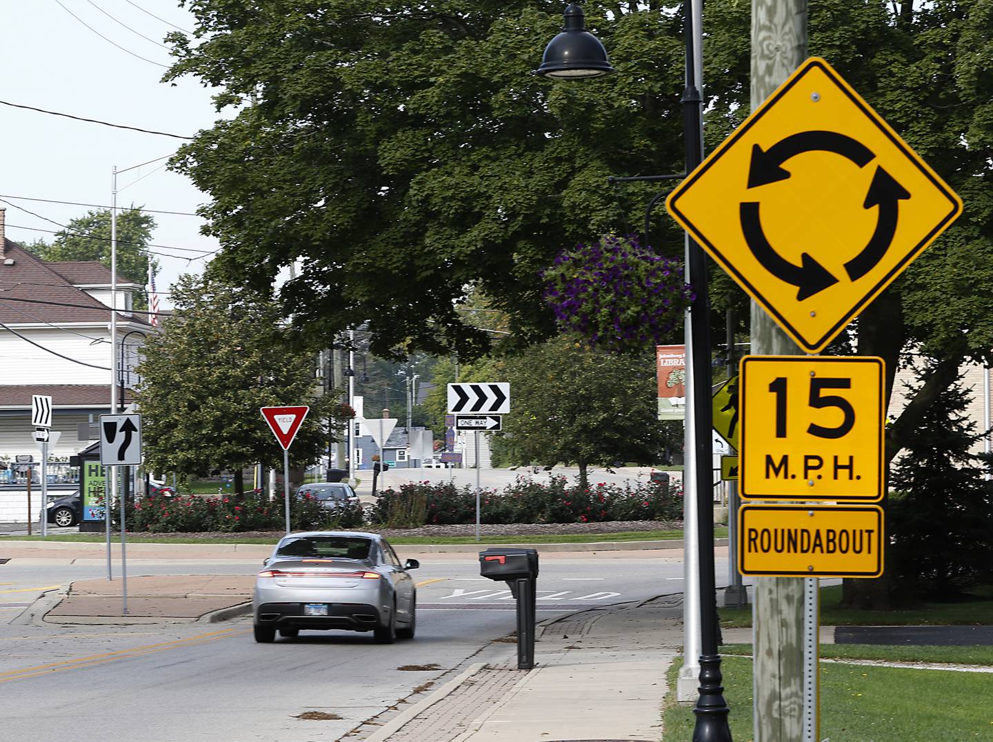 Traffic navigates the roundabout at the intersection of Johnsburg and North Chapel Hill roads on Tuesday, Sept. 20, 2022.  Roundabouts are a big part of planning and proposed solutions for traffic issues within McHenry County. There are half a dozen intersections where roundabouts are either planned or under construction and there are more sites that have been identified within McHenry County as being potentially suitable for roundabouts in the future. Data from Illinois Department of Transportation shows that roundabouts can significantly improve traffic and decrease both the number of crashes as well as the number of injuries and hospitalizations that occur when crashes do happen.