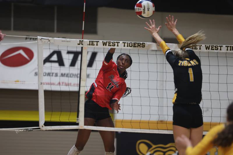 Bolingbrook’s Sydney Anderson hits a shot against Joliet West. Tuesday, Aug. 23, 2022, in Joliet.