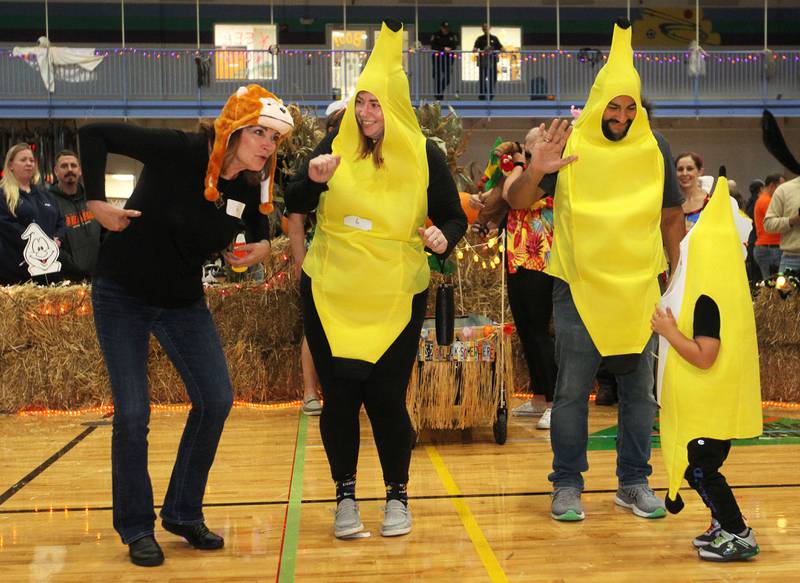 Geri Olejarz, of Oak Lawn, (Granny) dressed as a monkey dances with her family of bananas, Mary and Rick DeLeon, of Lindenhurst and their son, Roman, 4, as they show off their costumes in the family costume contest during Witchy Thrills & Chills at the Lindenhurst Park District Lippert Community Center on October 14th in Lindenhurst.
Photo by Candace H. Johnson for Shaw Local News Network