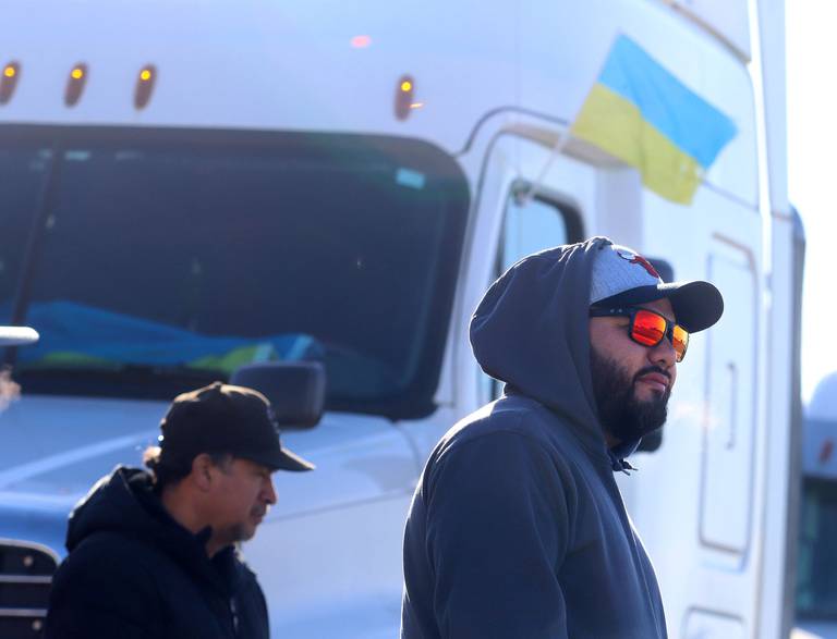 Uriel Gomez of Hoffman Estates gathers with other drivers Saturday morning in East Dundee to begin the Deblockade Mariupol truck protest rally hosted by Help Ukraine Foundation LTD to bring attention to the blockade of Mariupol.