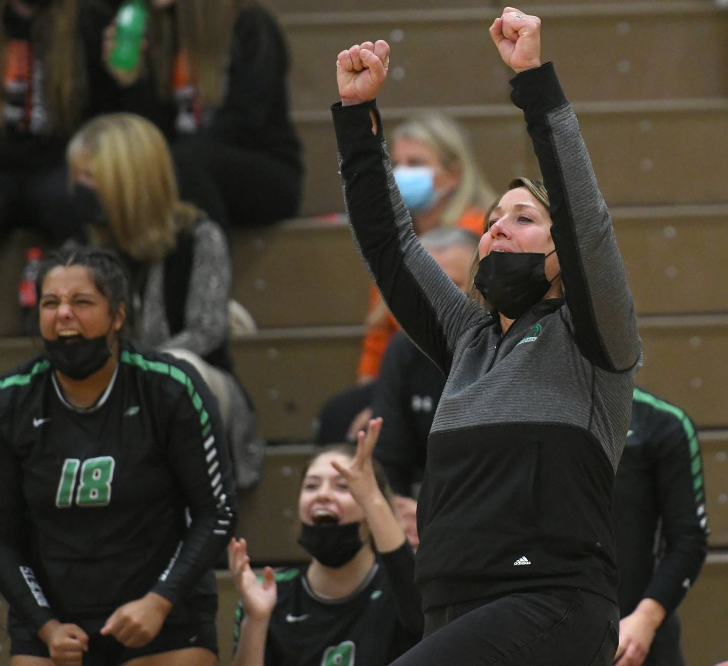 Rock Falls' Coach Sheila Pillars celebrates a point during the championship of the 2A Byron Regional
