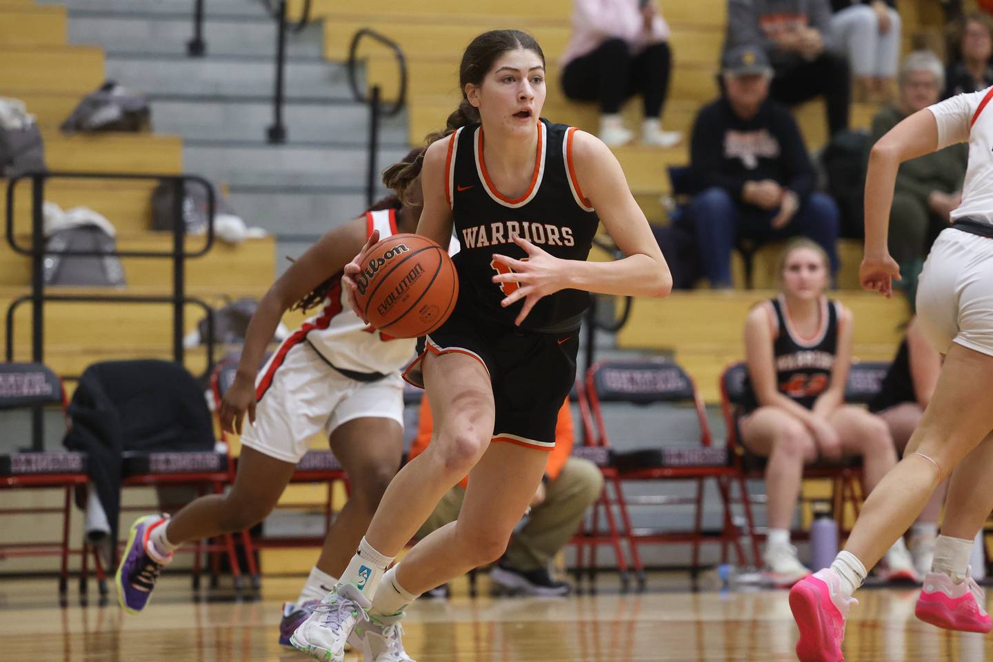 Lincoln-Way West’s Caroline Smith drives along the baseline against Lincoln-Way Central on Tuesday, Dec. 5, 2023 in New Lenox.