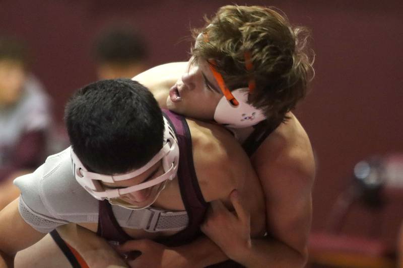 McHenry’s Brayden Oeffling, top, battles Prairie Ridge’s Leo Ruiz at 138 pounds in varsity boys wrestling on Thursday, Jan. 8, 2026 at Prairie Ridge High School in Crystal Lake.