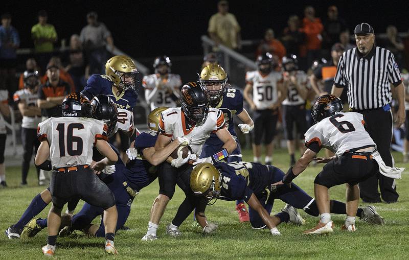 Milledgeville’s Evan Schenck fights for yards against the Polo defense Friday, Sept. 19, 2025.