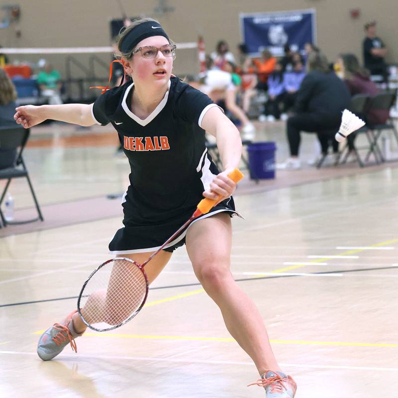 DeKalb junior Carly Kammes hits a backhand during her match against Dana Bogda, a senior from Lincoln-Way West Friday, May 10, 2024, during the IHSA State Badminton Finals at DeKalb High School. Kammes was able to advance after defeating Bogda.