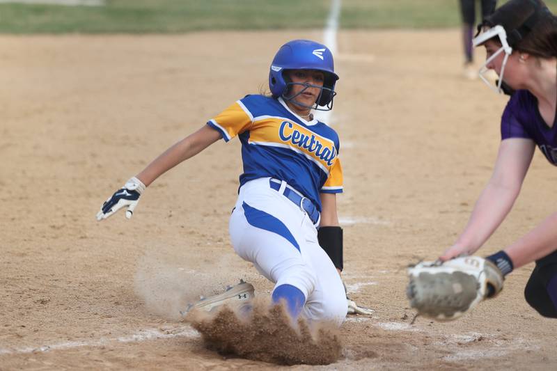Joliet Central’s Nevey Ibarra scores ahead of the tag Wilmington’s Rylee Lehnert on Tuesday, March 12 in Joliet.