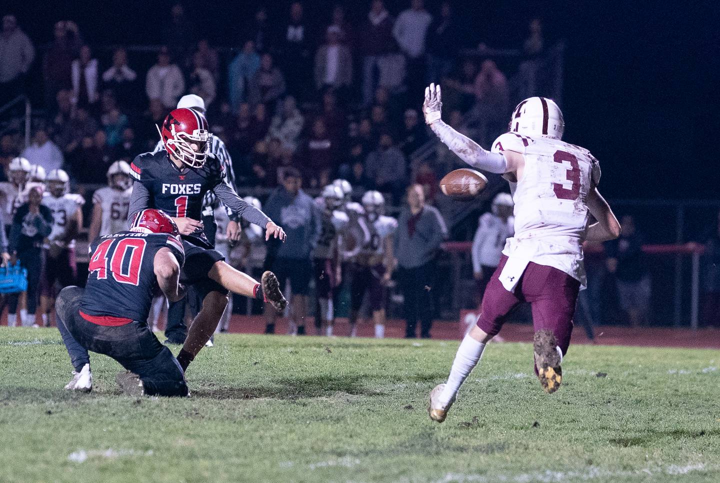 Yorkville's Hudson Fiene (1) kicks a field goal in overtime against Moline during a 7A second round playoff game at Yorkville High School on Friday, Nov 4, 2022.