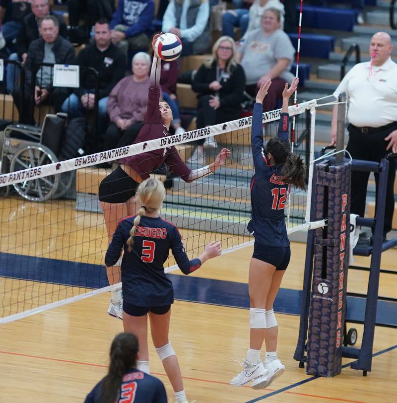 Lockport's Kylee Schurig (6) goes up for a kill against Oswego during a class 4A Oswego Sectional semifinal match at Oswego High School on Monday, Oct. 30, 2023.