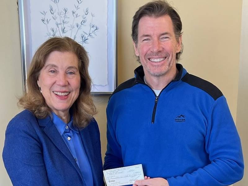 (Left to right); CASA DeKalb County executive director Jill Olson and Kishwaukee Sunrise Rotary Club member David Dosier