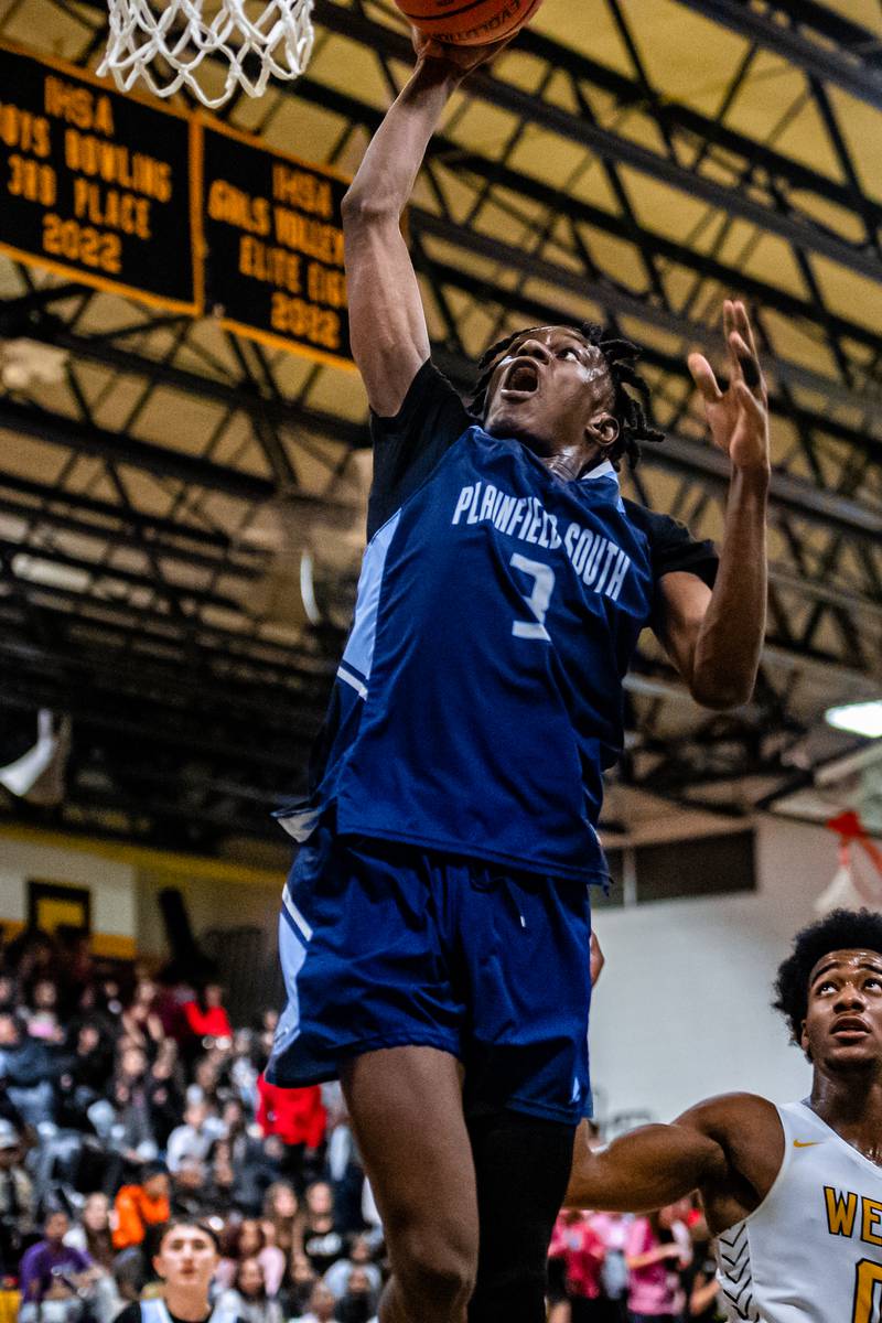 Plainfield South's Jeramine Theodore puts up a shot during a game against Joliet West Tuesday Feb. 14, 2023 at Joliet West  High School