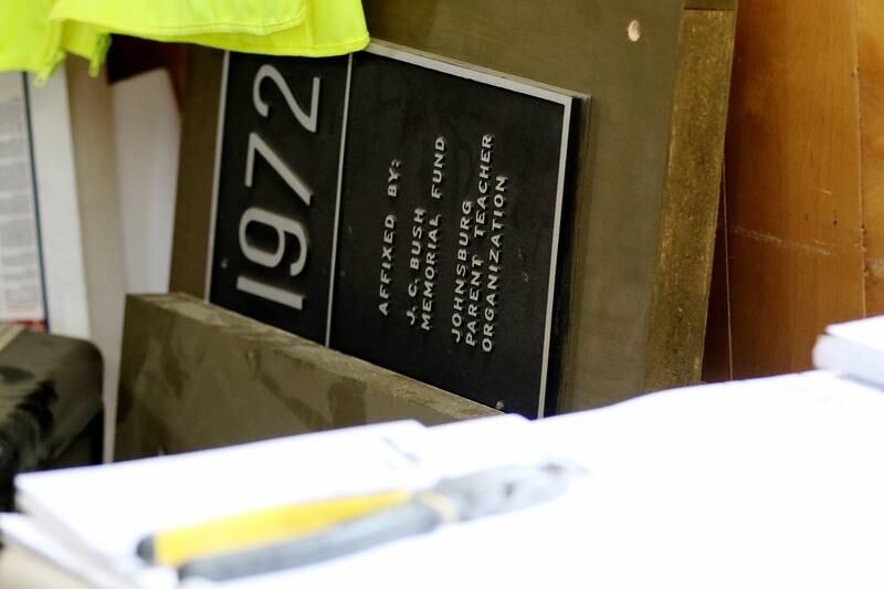 Signs for James C. Bush Elementary School sit in the construction trailer for the new Berkshire Johnsburg apartments, being built on the former school property on Monday, Feb. 8, 2021 in Johnsburg.  The new Berkshire Johnsburg apartment building will have 68 total units, all of which qualify as affordable housing for seniors.