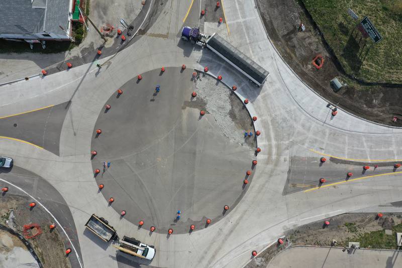 Trucks drive around the roundabout at the intersection of  Illinois Route 178 and Illinois Route 71 on Wednesday, April 19, 2023 in Utica. IDOT temporary converted traffic to use the circle while crews can work in the center. All lanes will remain open but motorists will have to yield to traffic prior to entering the roundabout. The project is scheduled to be completed by mid-June.