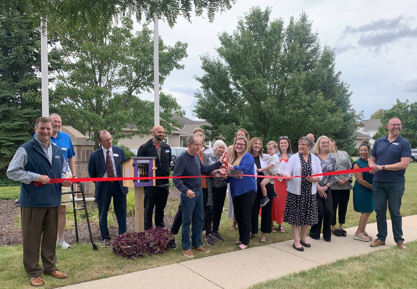 Encore Memory Care of Crystal Lake unveils their new Little Free Library with a ribbon cutting on Aug. 27, 2025.