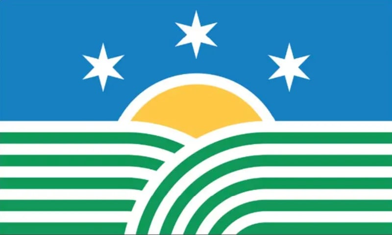 RELATIONSHIP TO ILLINOIS:
My connection to Illinois runs deep. My ancestors came from Ireland in the early 1900s and settled in Gridley, IL, where they farmed corn, soybeans, and raised livestock. My father grew up on that same farm, while my mother was raised in Champaign. They met at Illinois State University, where I also earned my Bachelor of Arts in graphic design. I’ve lived in Illinois my entire life, and its agricultural landscapes and small-town values make me proud to call Illinois home.

EXPLAIN THE MEANING BEHIND YOUR FLAG:
The 21 stripes represent Illinois as the 21st state and reflect its agricultural roots, resembling rows of crops and the open prairie. Three six-pointed stars represent the state’s three regions: northern, central, and southern; and their 18 points reference Illinois’ founding in 1818. A sun on the horizon, also featured on our current state flag, represents renewal. The colors Blue for unity, Green for agriculture, and Yellow for a bright future honor Illinois’ history and natural beauty.