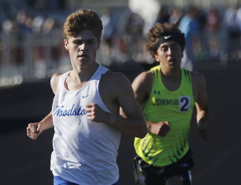 Woodstock's Ellery Shutt cruises to victory as he runs the 3200 meter run during the IHSA Class 2A Richmond-Burton Sectional Boys Track and Field Meet on Wednesday, May 20, 2026, at Richmond-Burton High School.