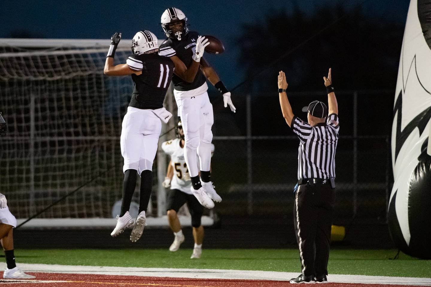 Plainfield Norths Amiel Clark and Colin Brown celebrate a touchdown during a game against Joiet West Friday Sept. 20, 2024 at Plainfield North High School
