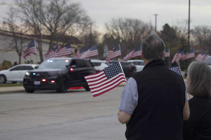 Attendees on Friday, April 18, 2025, outside Tezak Funeral Home in Joliet, for the funeral procession for U.S. Army Staff Sgt. Jose Dueñez Jr. He was one of four soldiers who died March 31, 2025 when their armored vehicle sunk in a bog during a training mission in Lithuania.