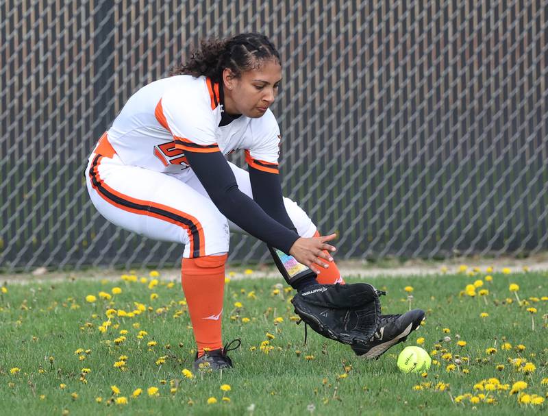 DeKalb's Sydney Myles fields a ball in center Friday, May 2, 2025, during their game against Sycamore at DeKalb High School.