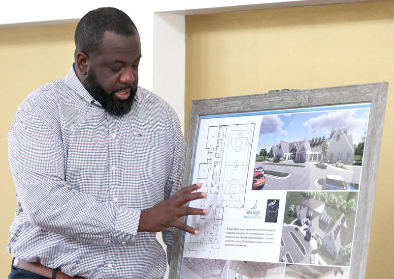 New Hope Missionary Baptist Church Pastor Joe Mitchell talks Friday, Feb. 24, 2023, at the church in DeKalb, about the plans for a community center addition at the church.