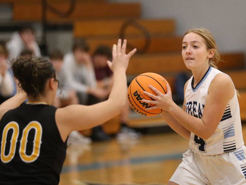 Bureau Valley's Ashlyn Maupin looks to pass the ball off as Riverdale's Amarah Coleman defends during the Thanksgiving Tournament on Wednesday, Nov. 20, 2024 at Bureau Valley High School.