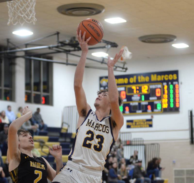 Polo's Noah Dewey lays the ball up and in against Ashton-Franklin Center on Tuesday, Jan. 2, 2024 at Polo High School.