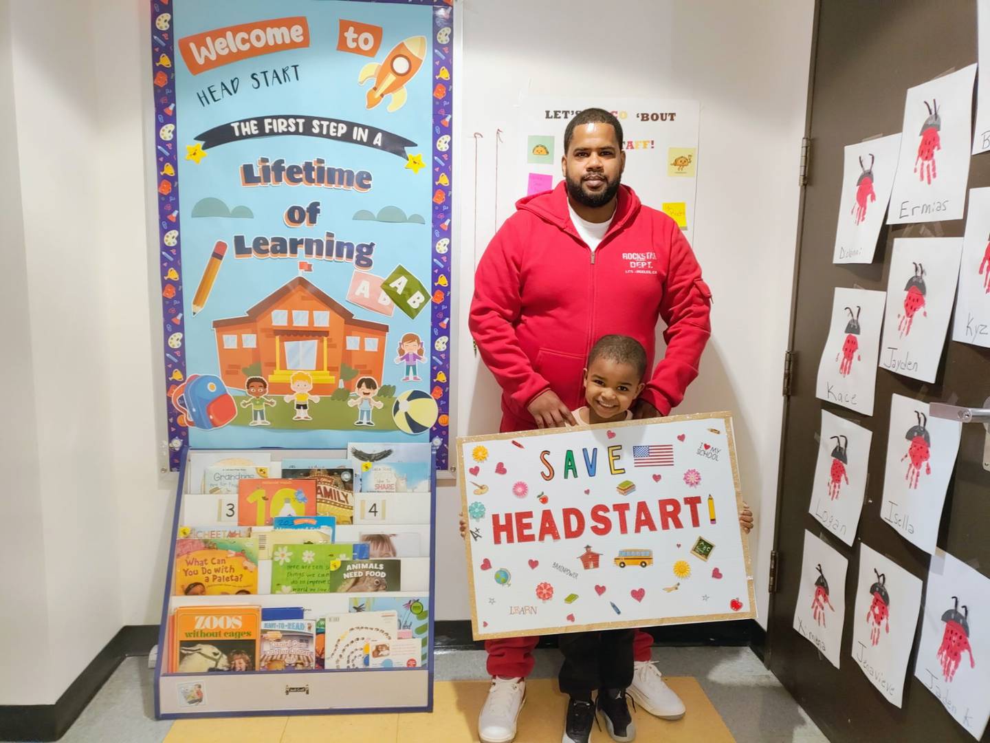 Kenan Kinney is pictured with his son Kace Kinney in support of Will County's Head Start program.