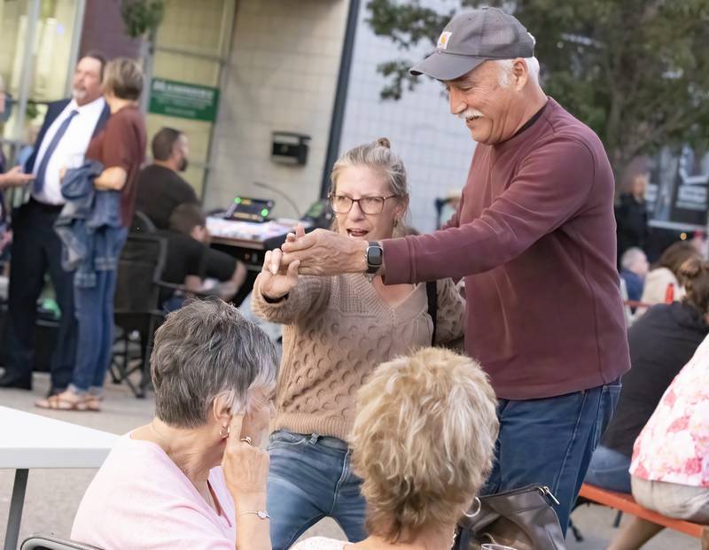 A couple of people dance through the crowd on Saturday, Sept. 9, 2023 at the LaSalle Business Association's Jazz'N the Street event.