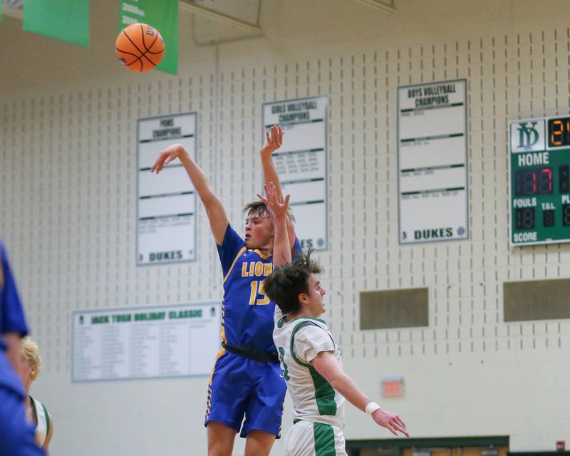 Lyon's Timmy Sloan (15) shoots a contested jumper during their basketball game between Lyons at York. Jan 10, 2025 in Elmhurst.