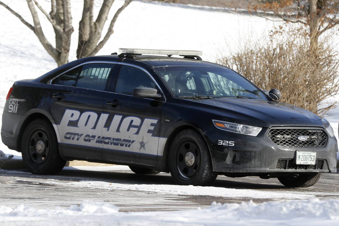 A McHenry police vehicle is seen on Wednesday, Jan. 5, 2022 in McHenry. City officials want to try to replace squad cars every five years, and longer periods for heavier vehicles like plow trucks, and would need to spend about $634,000 a year on replacement of vehicles on their ideal schedule for equipment life, which includes about $120,000 a year on replacing the police department's outdated or worn light equipment like laptops.