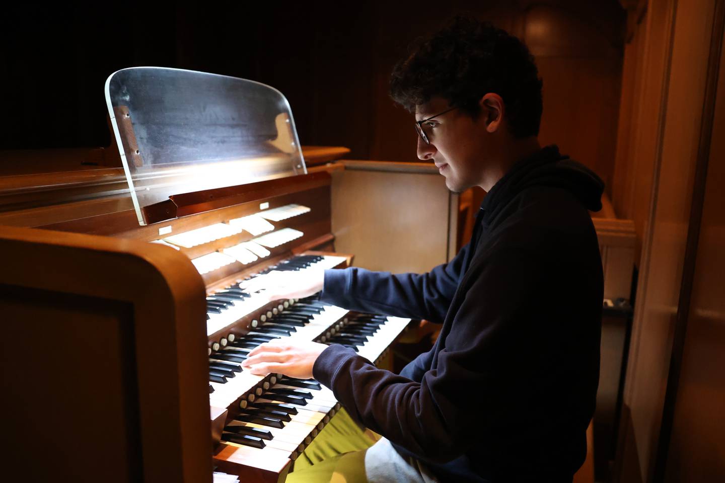 Michael Del Rio, a student of Sarah Randolph, a retired Lockport district music teacher, plays the organ at the First Presbyterian Church in Joliet.