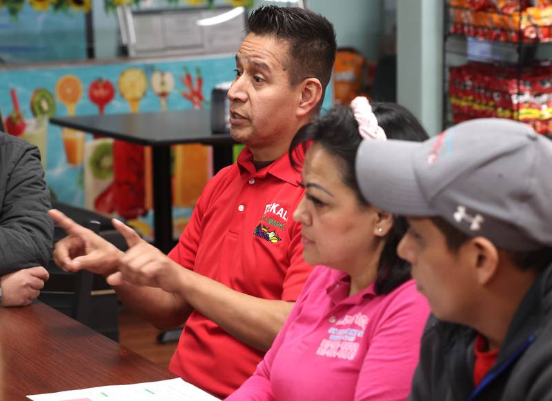 Martin Garcia, owner of DeKalb Fresh Market, along with other local business owners, talk about their reasons for participating in a Day Without Immigrants Monday, Feb. 3, 2025, during a meeting at Flamingo Restaurant & Ice Cream in DeKalb. More than 30 DeKalb County businesses closed on Monday to show solidarity in their stance against President Donald Trump’s anti-immigration policy.