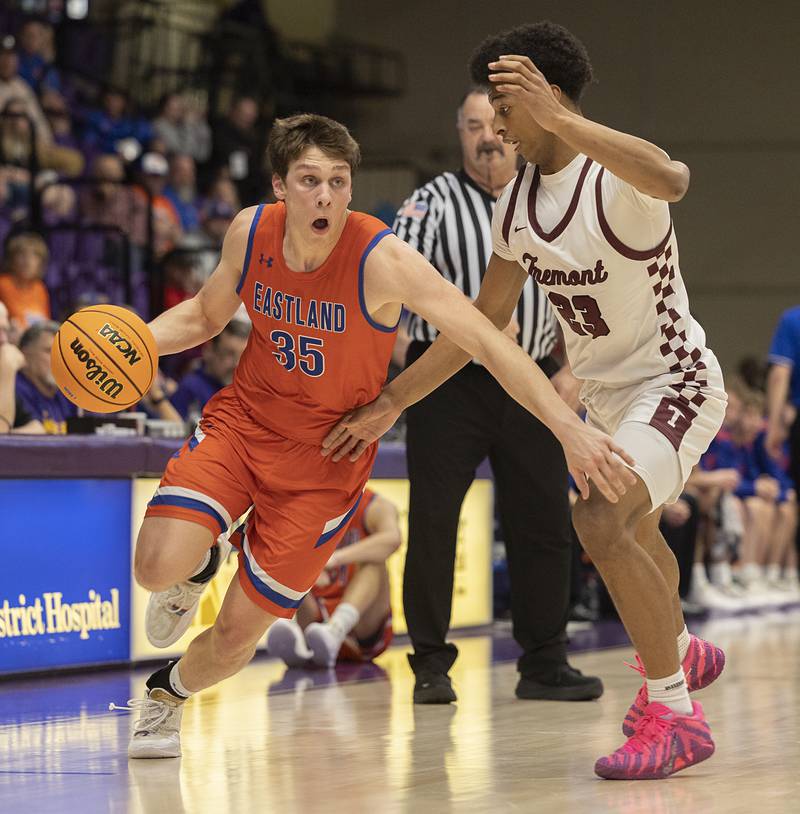 Eastland’s Parker Krugman drives against Tremont’s Brandon Tennon Monday, March 9, 2026, in the Class 1A Macomb Supersectional.