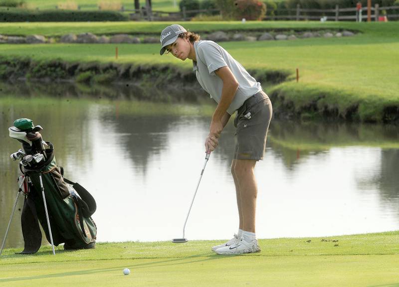 Plainfield East's Josh Winterroth putts on the 4th green during the Southwest Prairie Conference boys golf meet at Blackberry Oaks Golf Course in Bristol on Wednesday, Sept. 20, 2023.