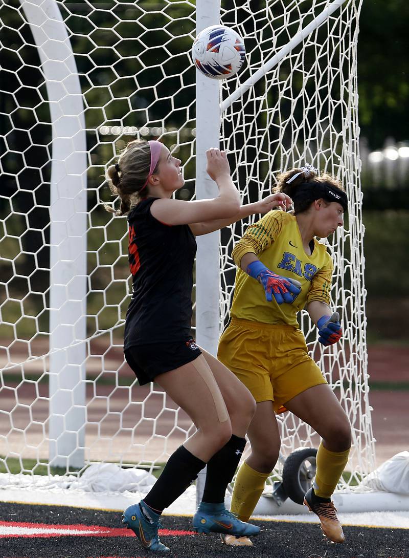 Libertyville’s Lilly Frantz tries to get to the ball after it bounces of the hands Lincoln-Way East's Mattea Arroyo during the IHSA Class 3A state third-place match at North Central College in Naperville on Saturday, June 3, 2023.