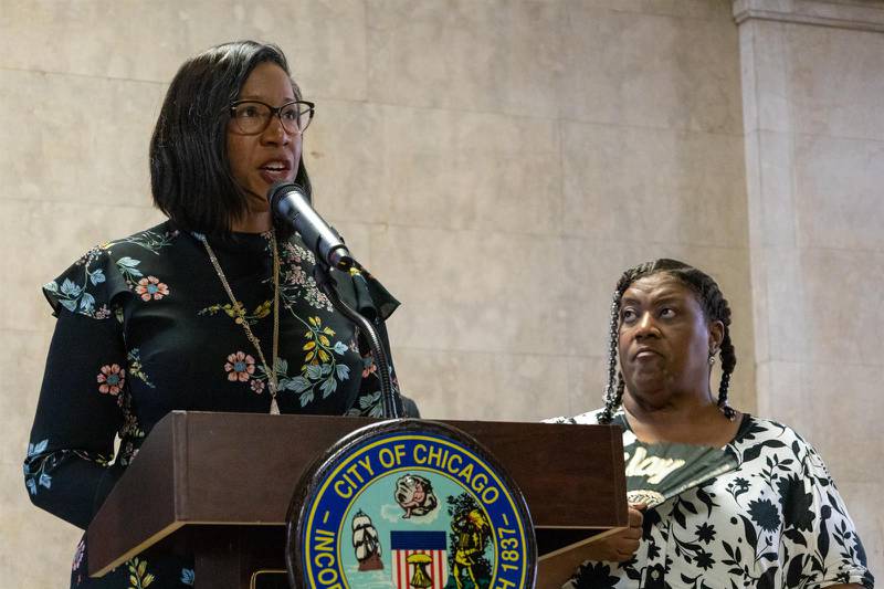 Chicago City Treasurer Melissa Conyears-Ervin calls for a reduction to a requested utility rate increase by Peoples Gas at a June 1, 2023, news conference. Rosazlia Grillier, a resident of West Englewood and advocate for low-income families, is also pictured.