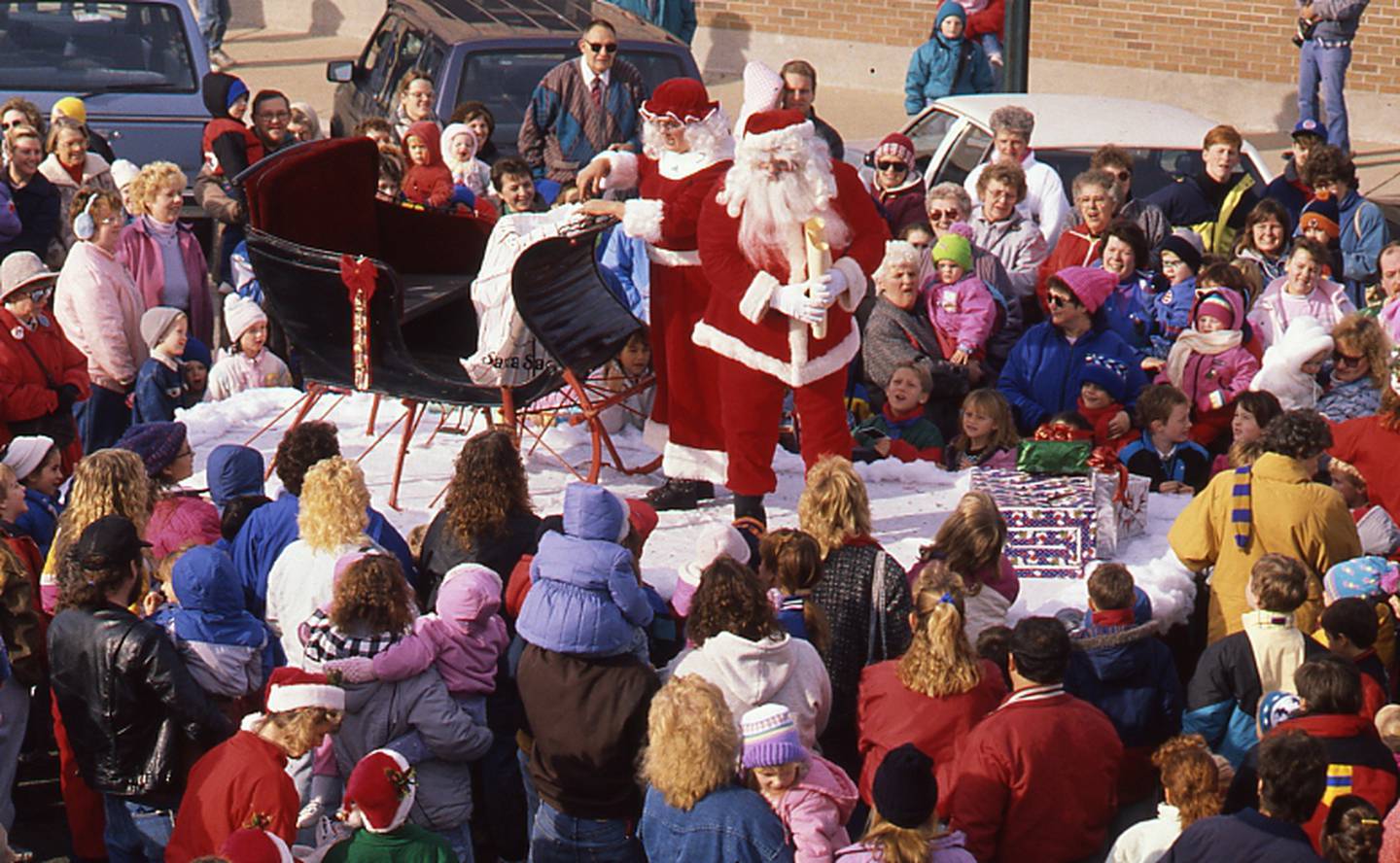 A 1990 Christmas parade in Harvard where Santa visits in his sleigh.