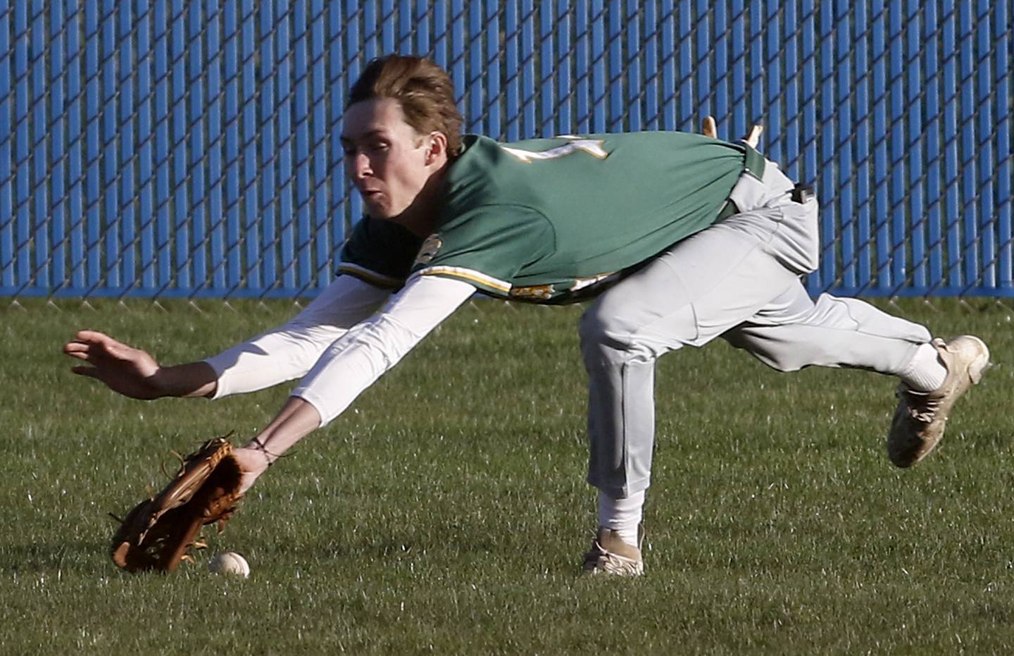 Crystal Lake South's James Carlson can’t come up with the catch during a Fox Valley Conference baseball game against Burlington Central on Friday, April 12, 2024, at Burlington Central High School.