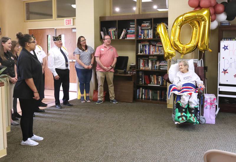 Family, DeKalb city officials, veterans and care center staff sing Happy Birthday to World War II veteran Myrtle Annetta Lusiak Thursday, May 2, 2024, at Aperion Care in DeKalb. Lusiak, who was honored Thursday with gifts and proclamations, turned 107-years-old and served in the Women’s Army Corps from Aug. 5, 1943 until her honorable discharge on Nov. 27, 1945.