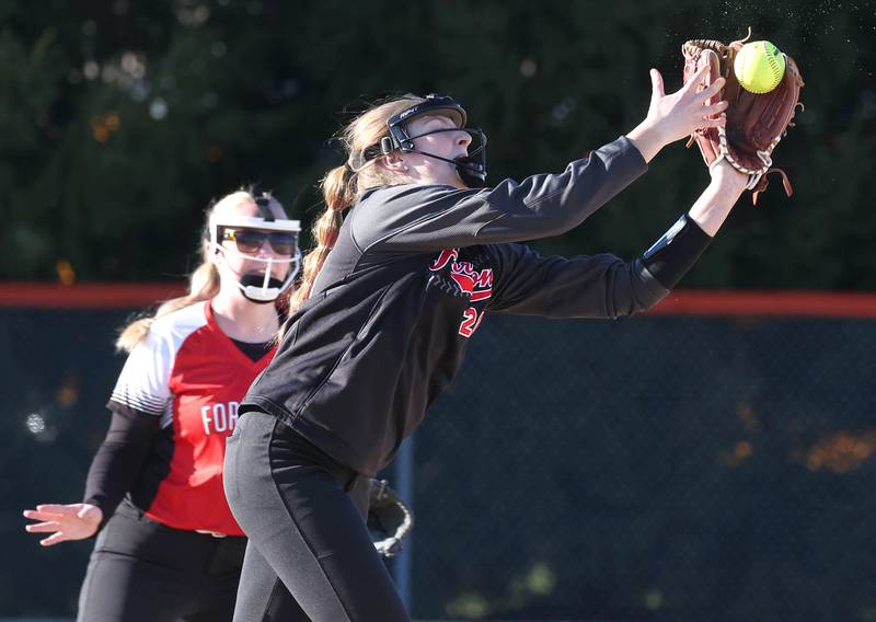 Forreston’s Jenna Greenfield tries to grab a fly ball during their game against Genoa-Kingston Friday, March 15, 2024, at Genoa-Kingston High School.