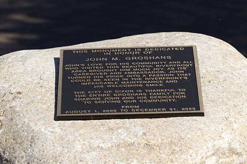 The plaque is situated on a boulder on the Dixon riverfront.