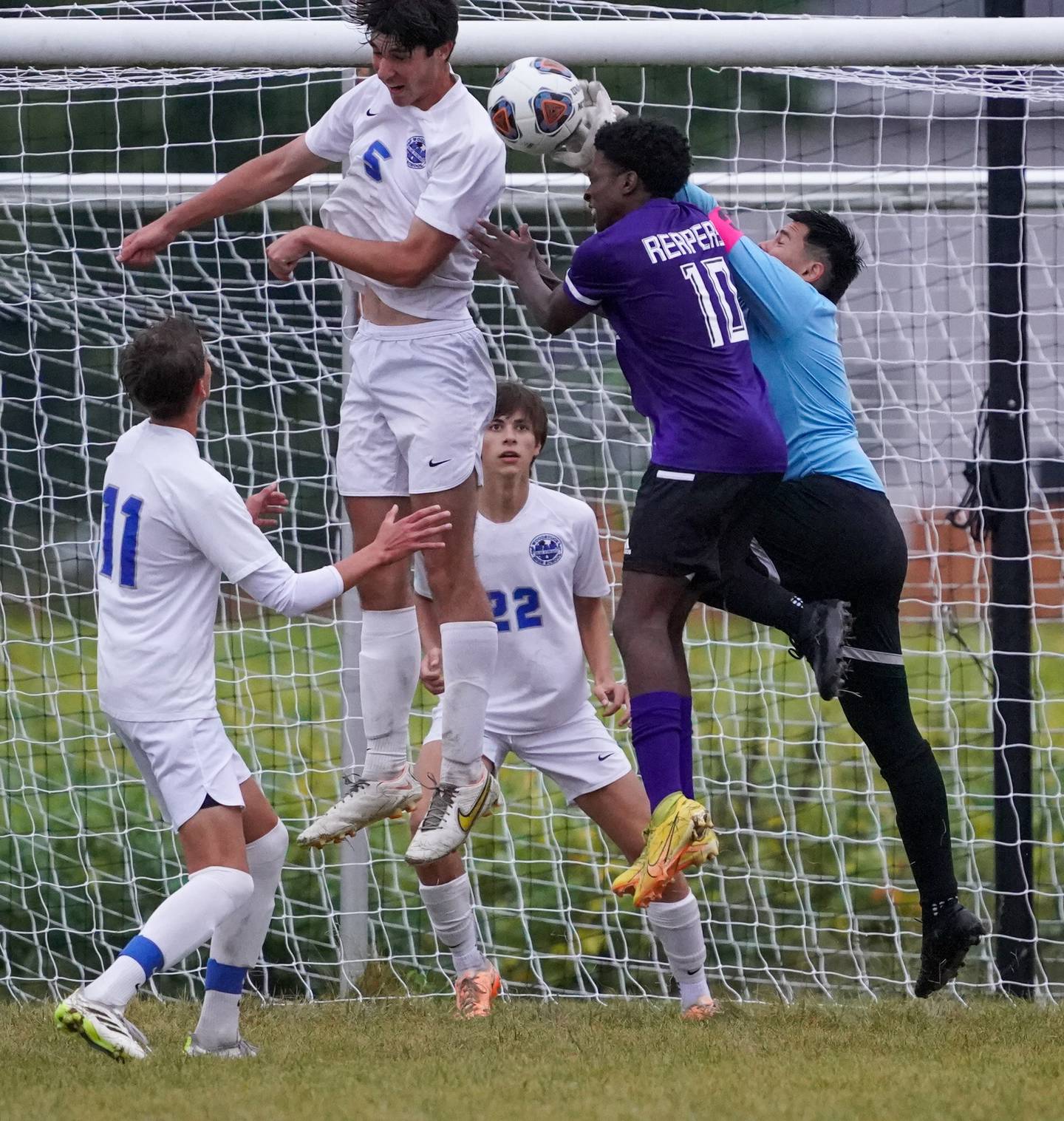 Woodstock's Diego Landeros (right) defends the net against Plano's Davione Stamps (10) during a soccer match at Plano High School on Monday, Sept. 11, 2023.