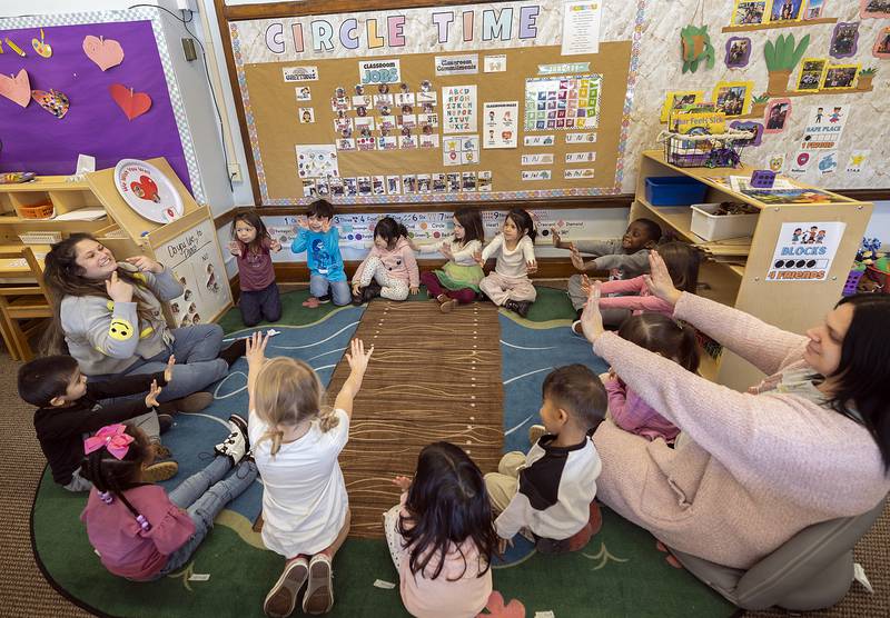 Teachers in the Head Start program lead the children through calming breathing exercises Thursday, Jan. 23, 2025.